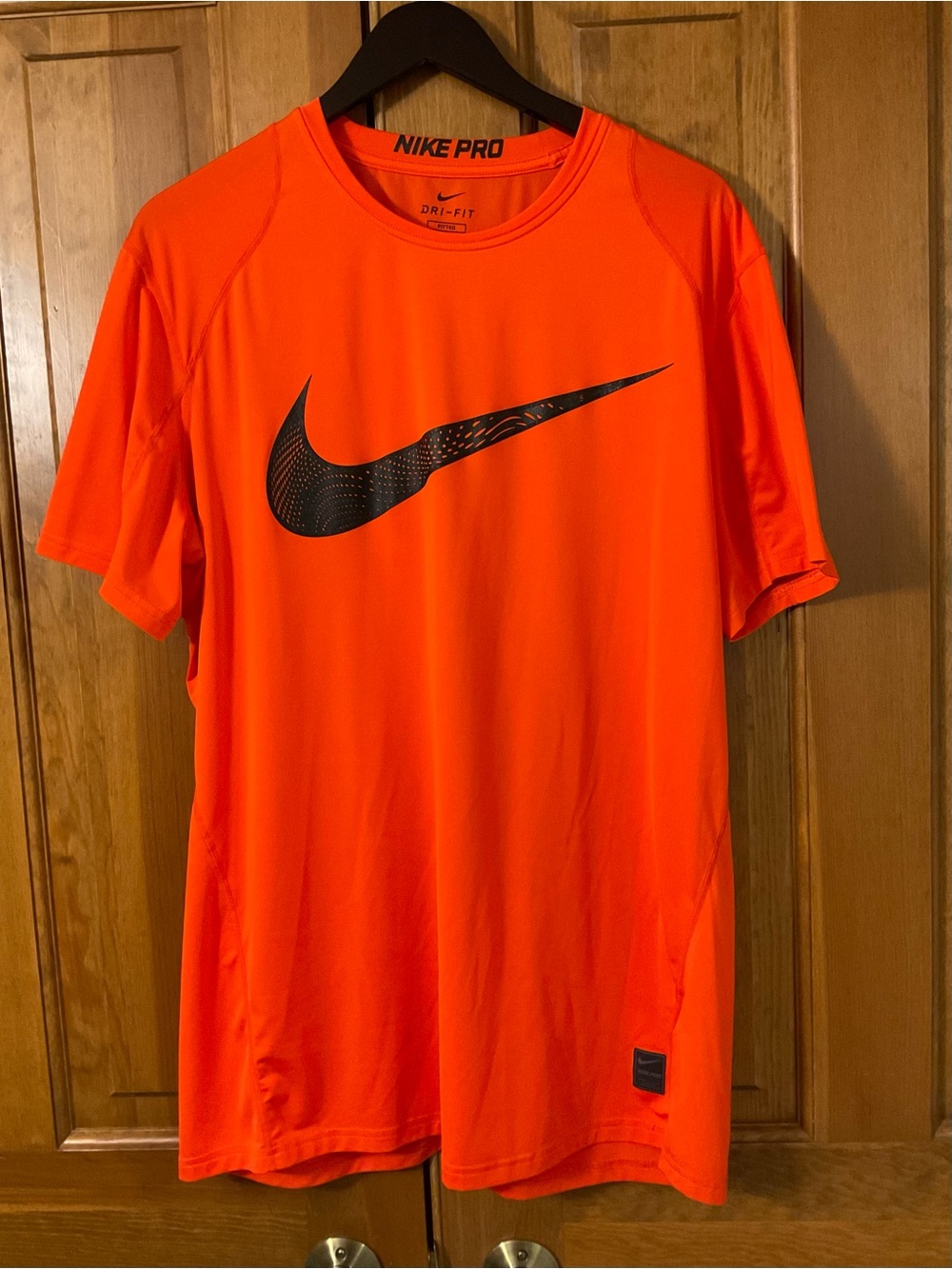 Nike Men’s Bright Orange Dri-FIT Short Sleeve Tee with Black Swoosh